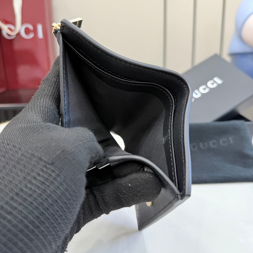 Gucci Black Leather Openwork Wallet